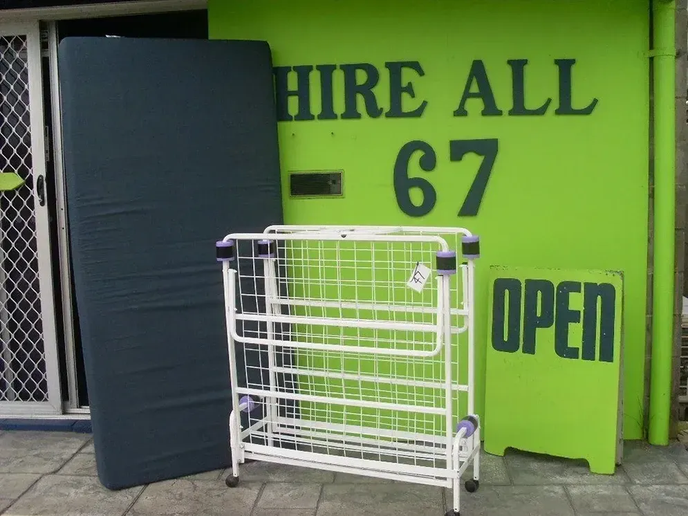 A Green Sign That Says Hire All 67 on It — Hire All in Tugun, QLD