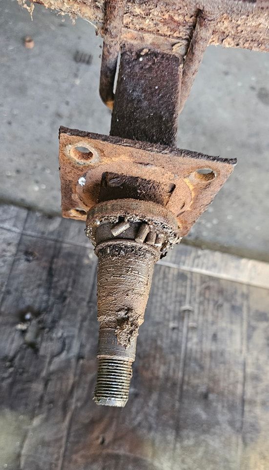 A Close Up of a Rusty Metal Object on a Wooden Floor — Dempsters Caravan & RV in Thabeban, QLD