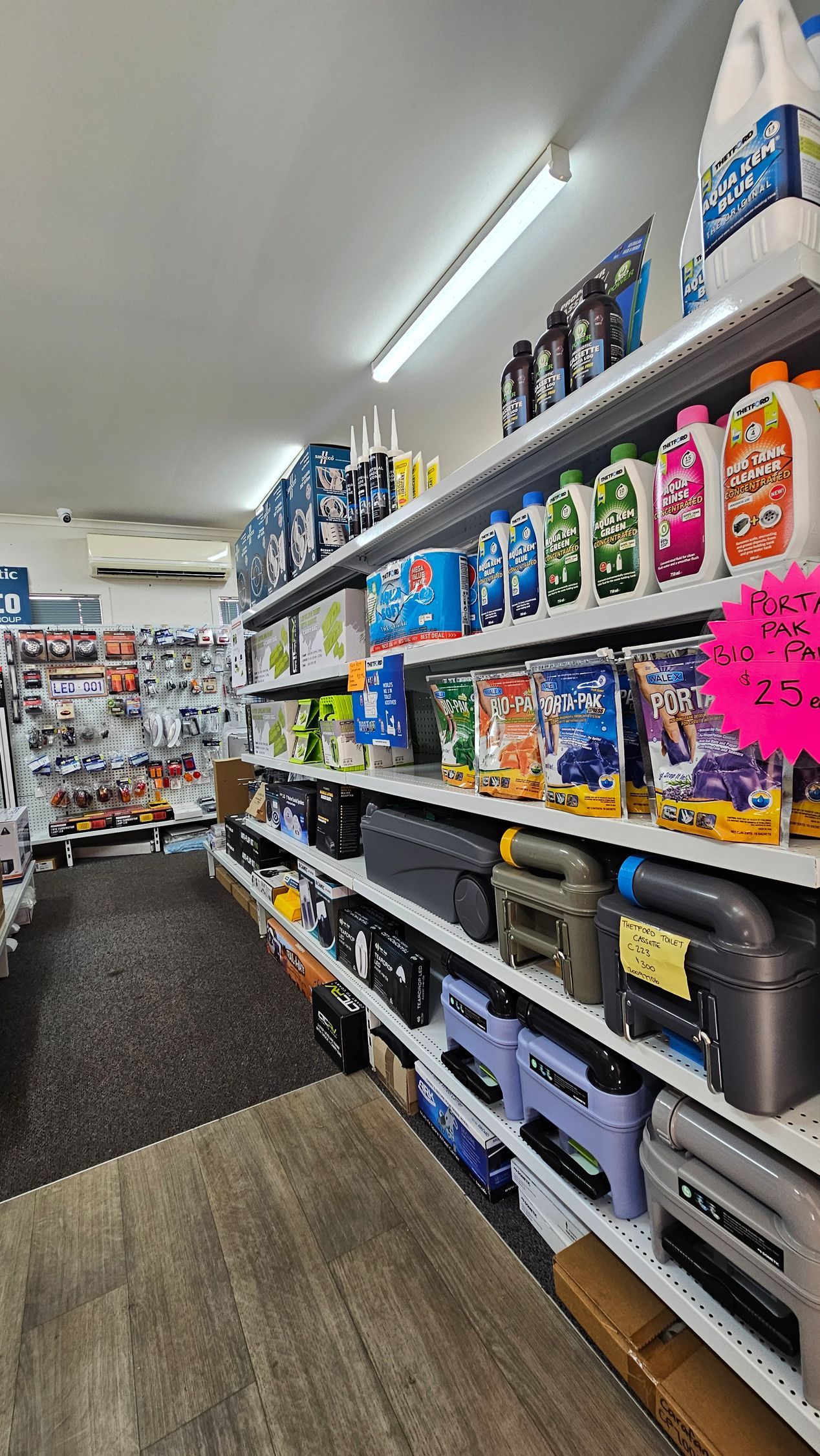 Caravan Parts are Hanging in a Store — Dempsters Caravan & RV in Thabeban, QLD