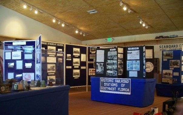 A museum with a sign that says historic railroad stations of southwest florida