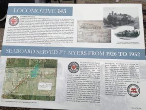 A sign that says locomotive 143 seaboard served ft myers from 1926 to 1952