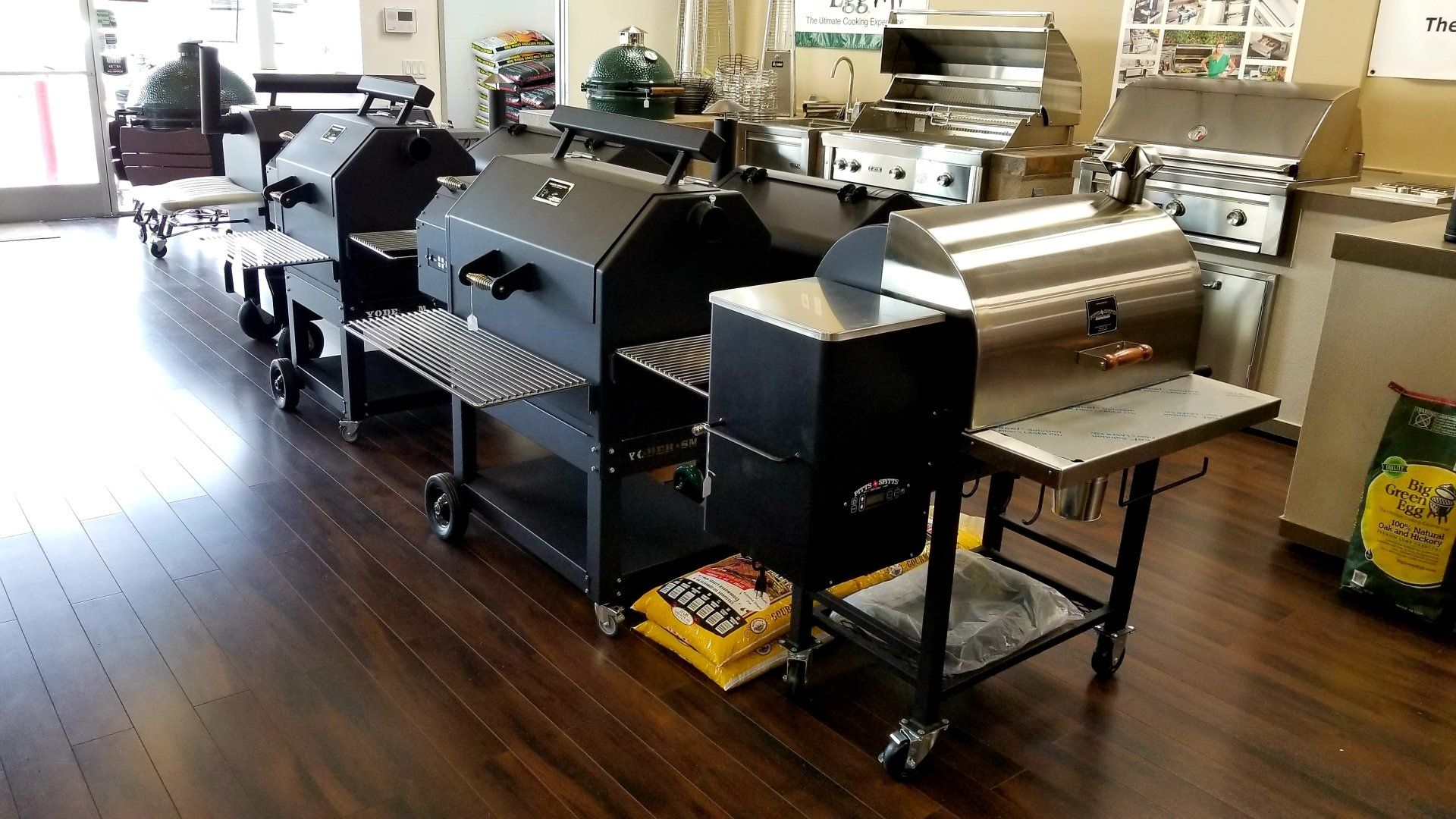 a bunch of grills are on display in a store