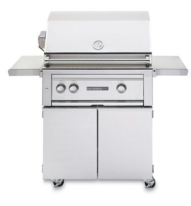A stainless steel grill is sitting on a cart on a white background