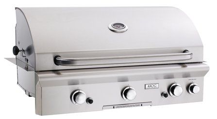 A stainless steel grill with a handle and knobs on a white background.