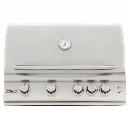 A stainless steel grill with four knobs and a thermometer on a white background.