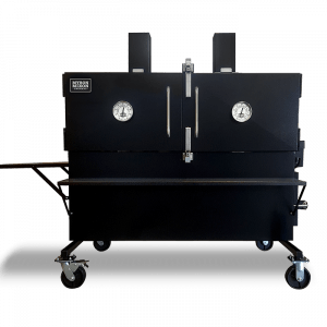 A large black box with wheels and two clocks on it