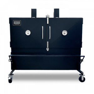 A large black box with wheels and two clocks on it