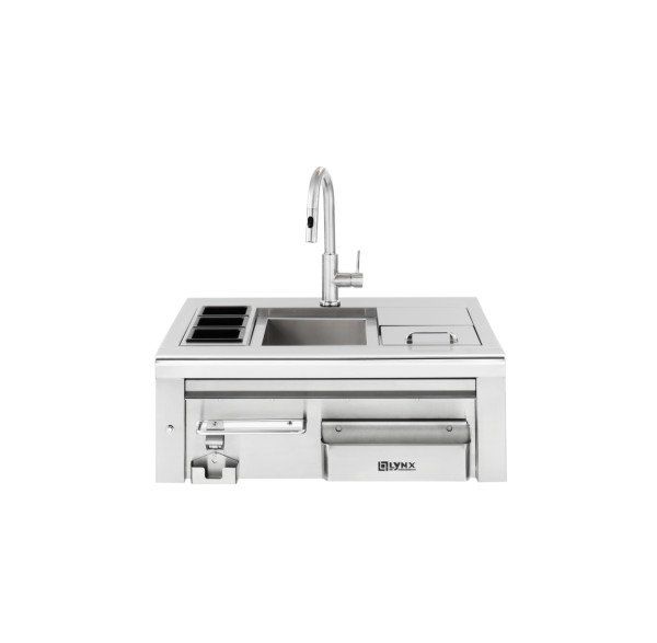 A stainless steel kitchen sink with a faucet and drawers