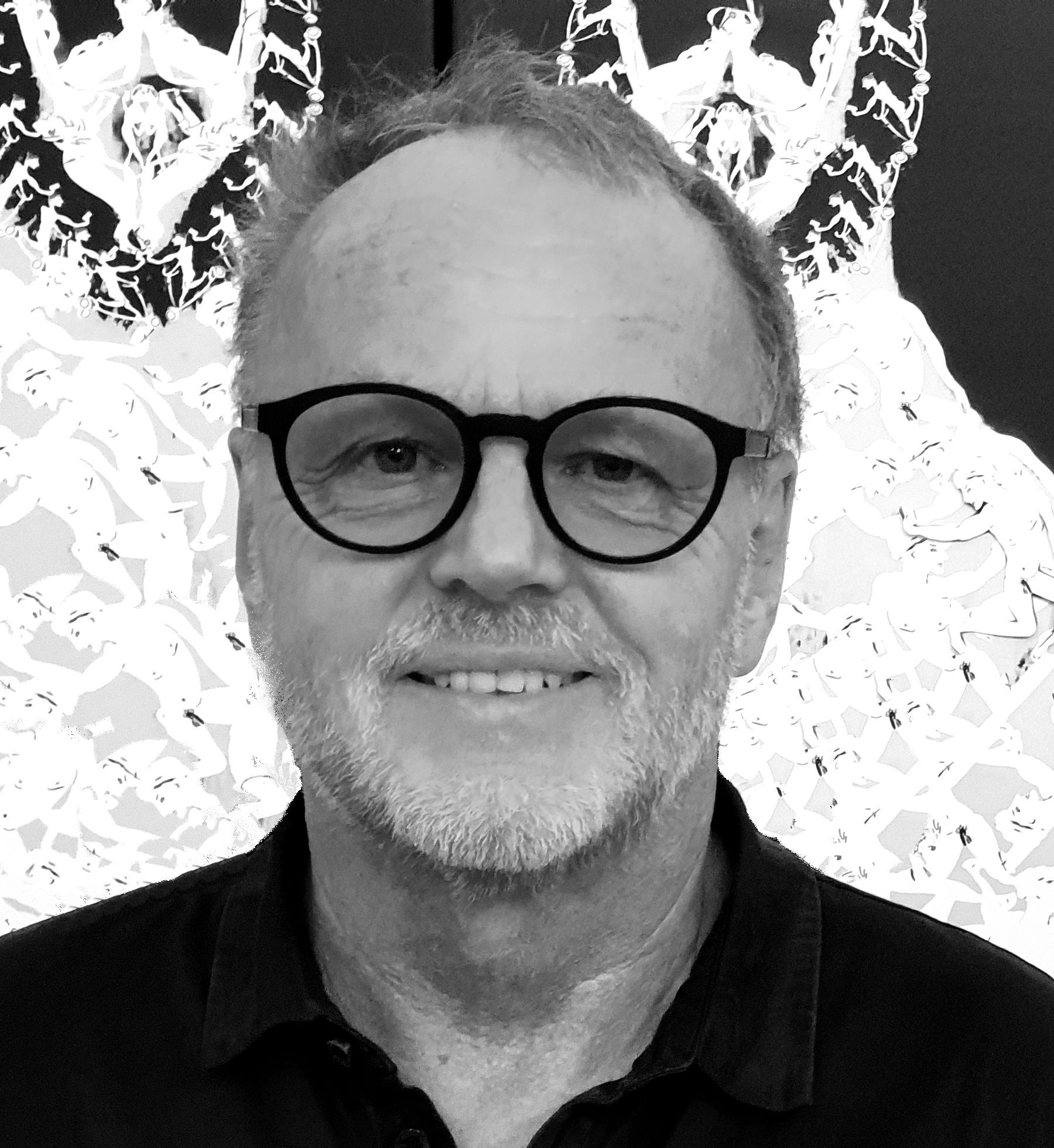 Artist Garbade with glasses smiles, against a backdrop of abstract art.