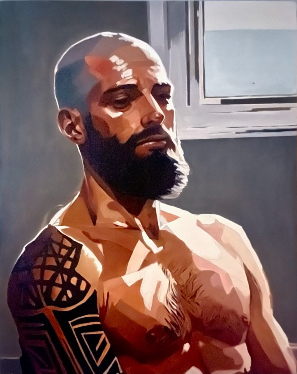 Bald man with a full beard, bare-chested with a tattoo on his left shoulder. He's looking down, lit by sunlight.