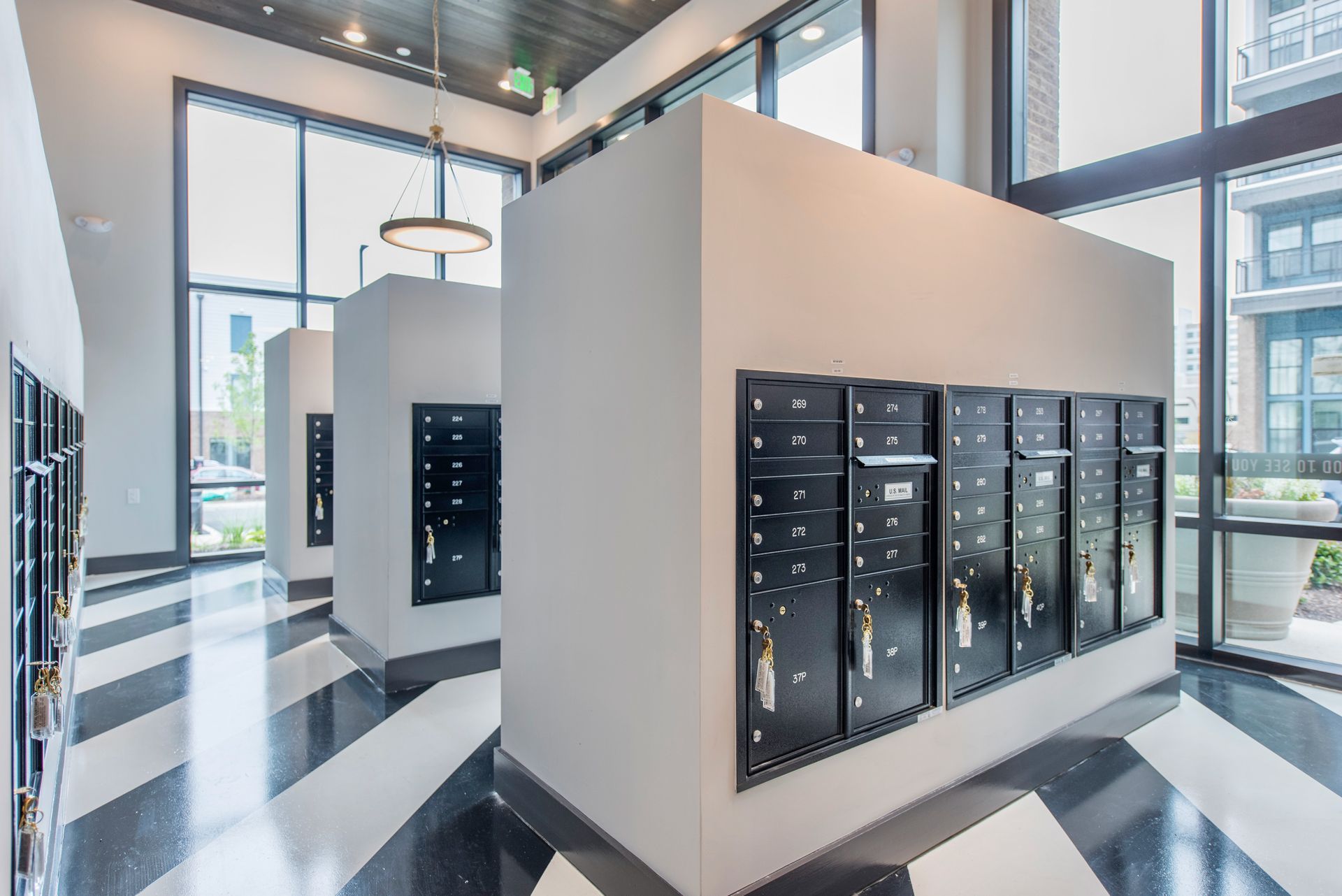 Mailroom with a lot of lockers.