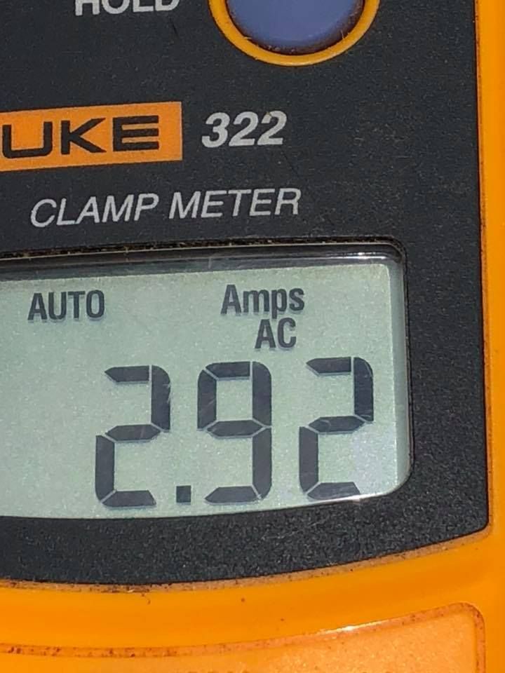 A close up of a fluke 322 clamp meter