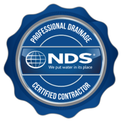 Blue NDS Professional Drainage certified contractor seal logo with globe icon and white text