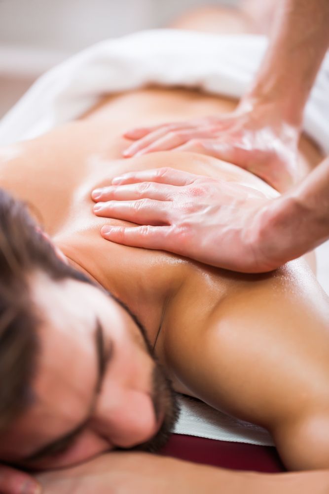 A Man is Getting a Massage at a Spa — Kerry's Body Therapy in Millner, NT