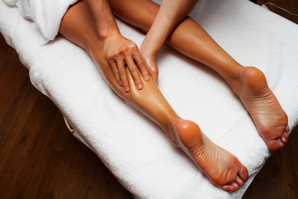 A Woman is Getting a Leg Massage at a Spa — Kerry's Body Therapy in Millner, NT