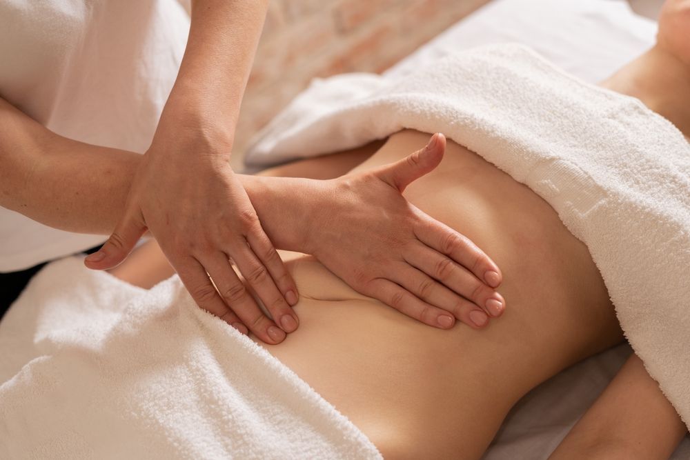A Woman is Getting a Massage on Her Stomach at a Spa — Kerry's Body Therapy in Millner, NT