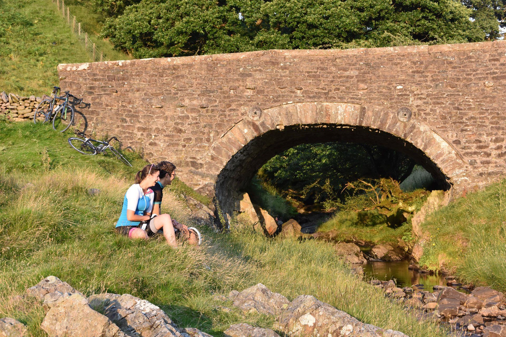 Britain's best bike ride book cover sat by river and arched bridge