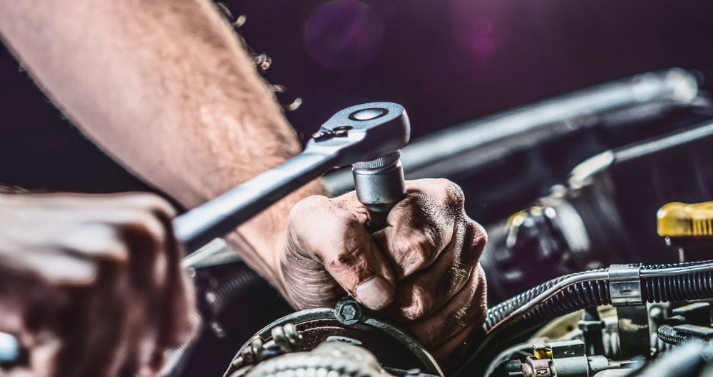 Auto Mechanic Working on Car Engine in Mechanics Garage — Your Local Auto Electrician & Mechanic in Bundaberg, QLD