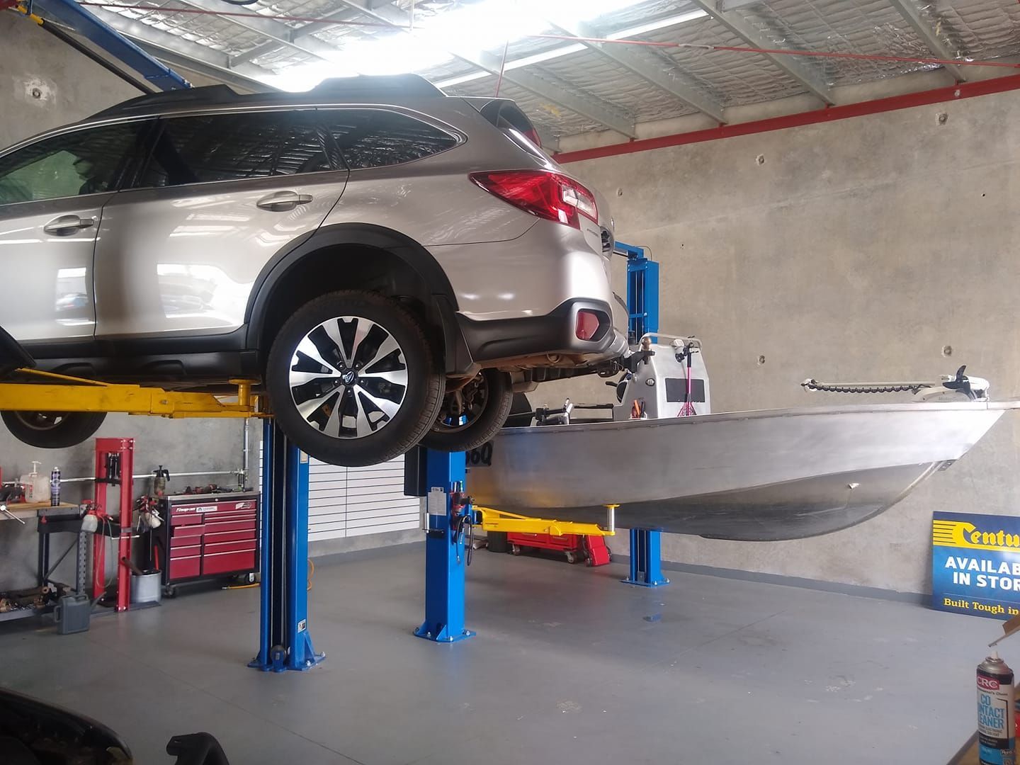 Car Lifted for Inspection — Your Local Auto Electrician & Mechanic in Bundaberg, QLD