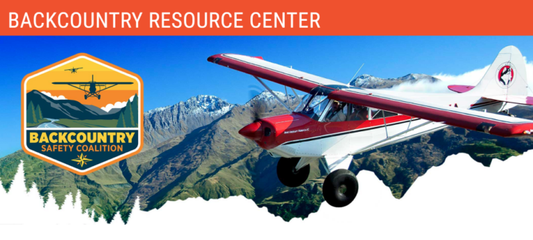 The backcountry resource center has a plane flying over mountains