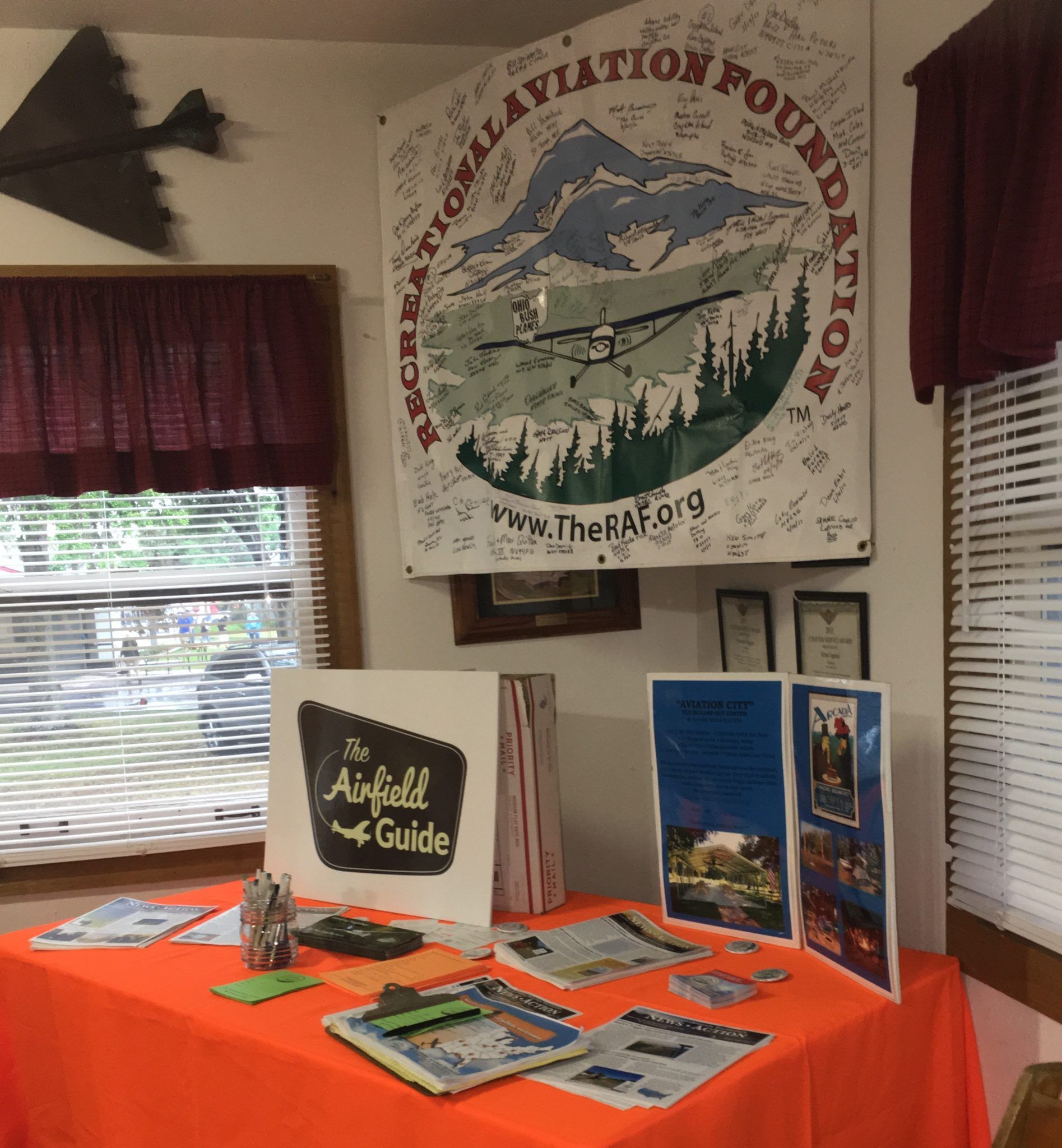 A table with a sign that says national aviation foundation