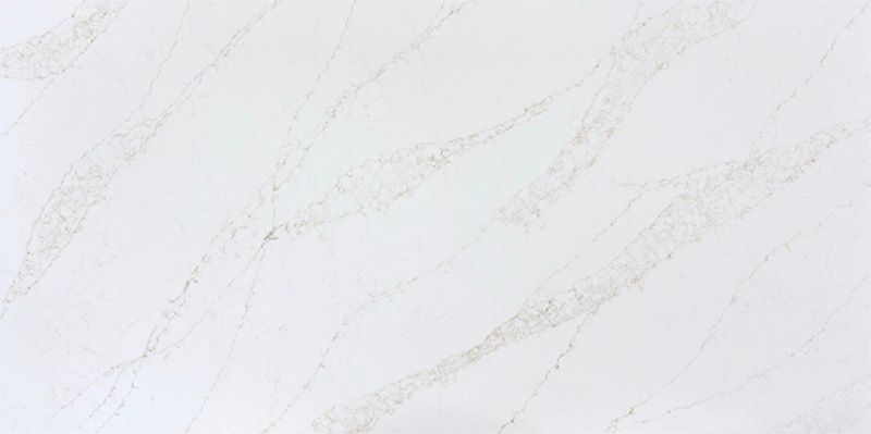 A close up of a white marble counter top.