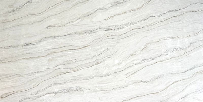 A close up of a white marble counter top.