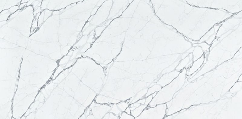 A close up of a white marble counter top.