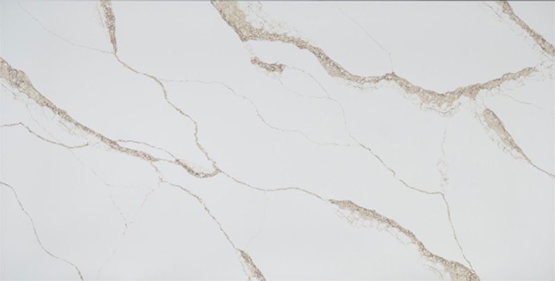 A close up of a white marble counter top with a marble texture.