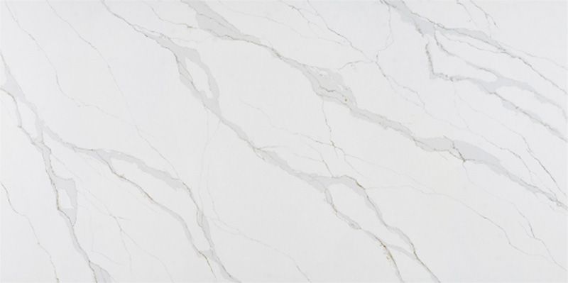 A close up of a white marble tile with a marble texture.
