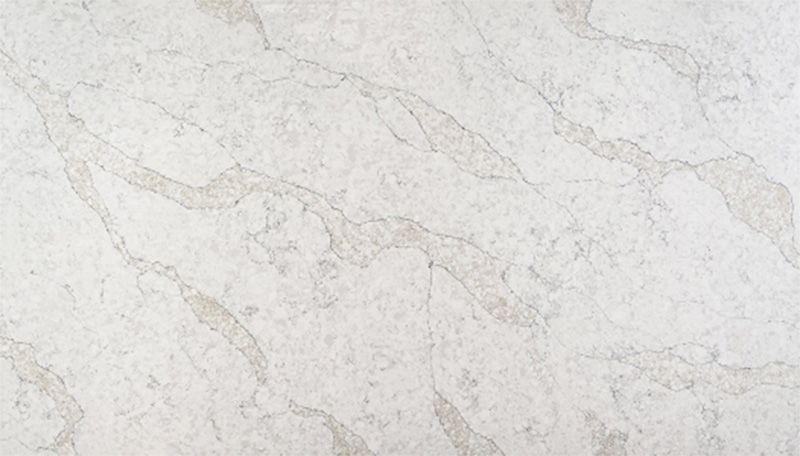 A close up of a white marble counter top.