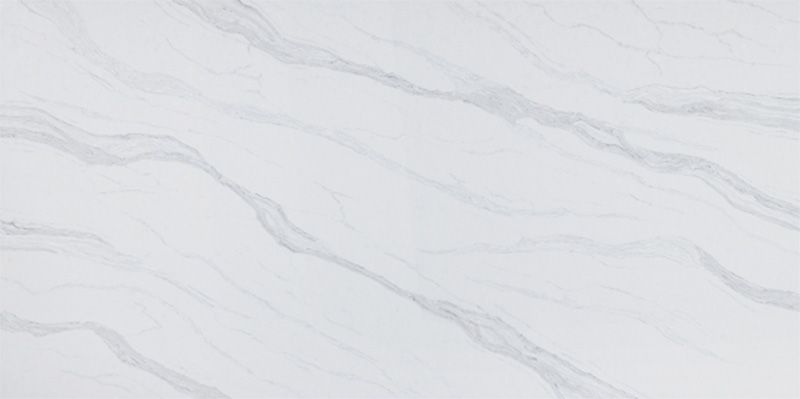 A close up of a white marble tile with a marble texture.