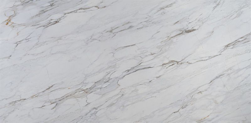 A close up of a white marble counter top.