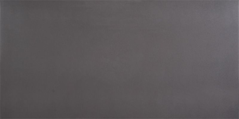 A close up of a gray tile with a plain texture.