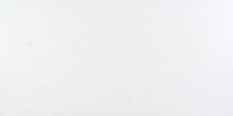 A close up of a white tile with a marble texture.