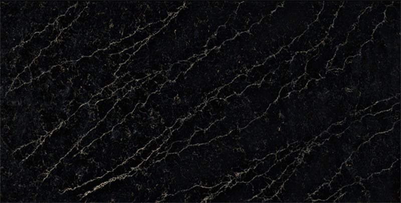 A close up of a black marble slab with white veins.