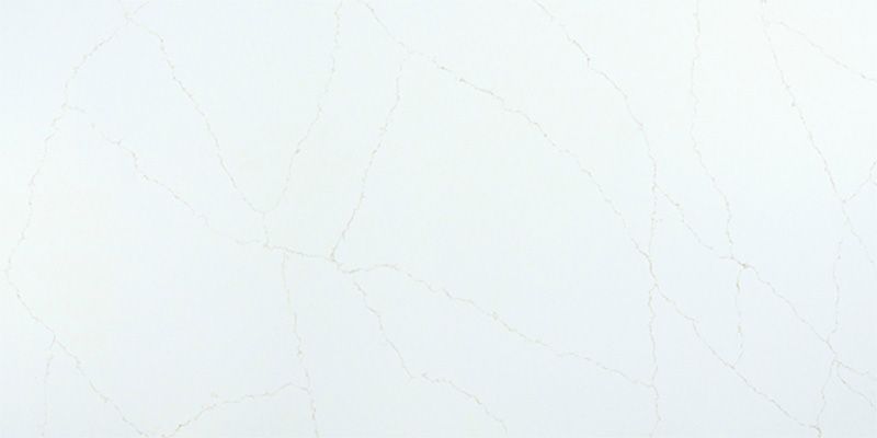 A close up of a white tile with a marble texture.