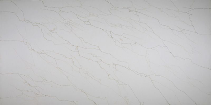 A close up of a white marble counter top.