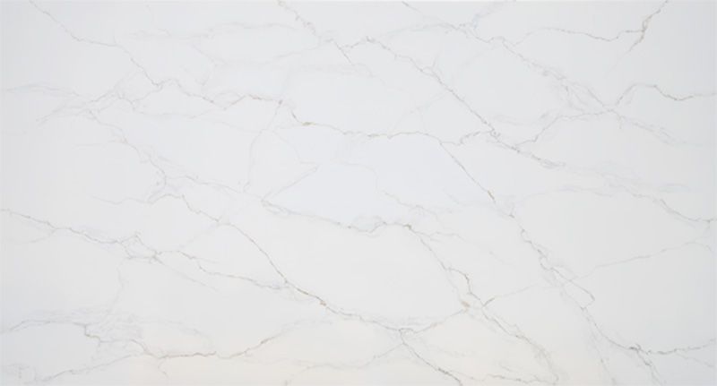 A close up of a white marble counter top.
