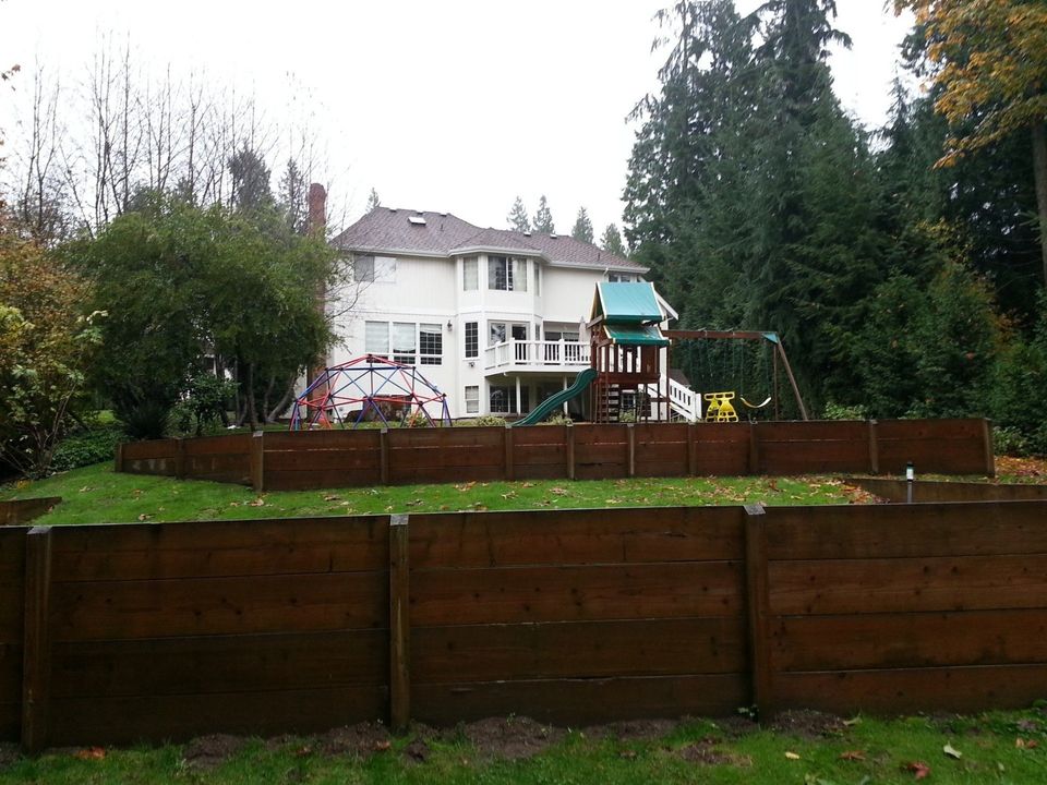 before backyard lawn with playground