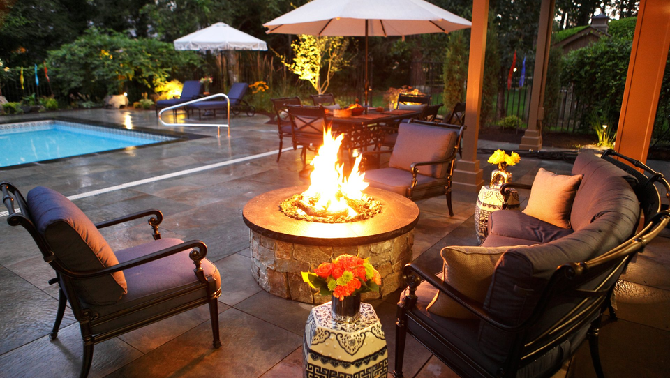 classic blue patio furniture and firepit