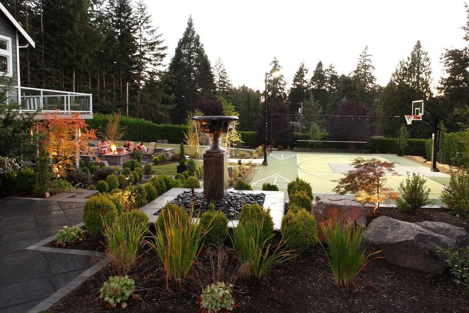 outdoor resort, firepit and sports court with water feature