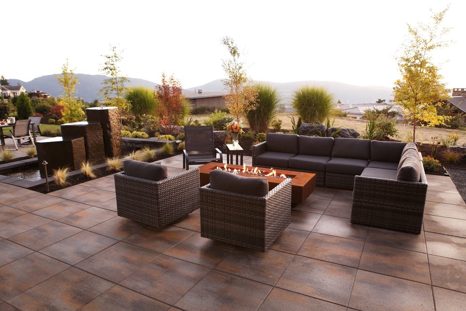 outdoor backyard resort patio paver fireplace