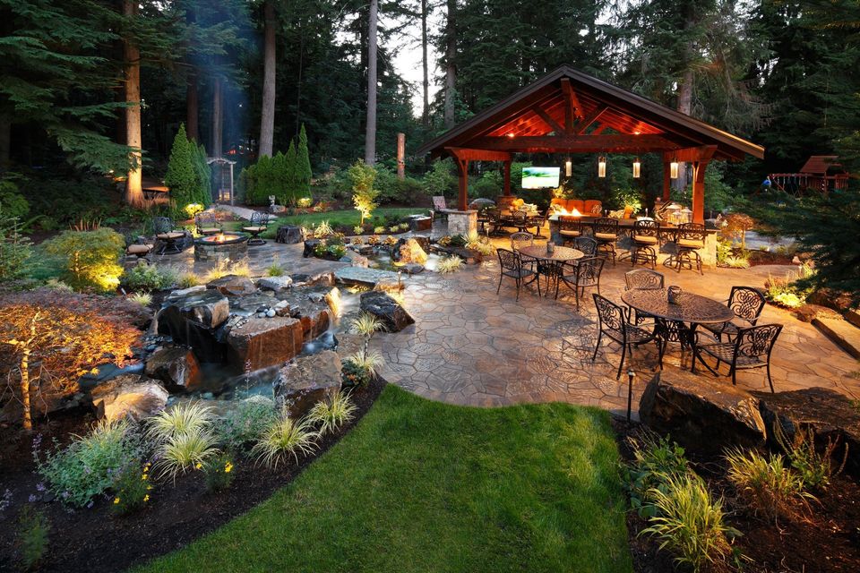 Redmond resort with large paver patio and outdoor structure