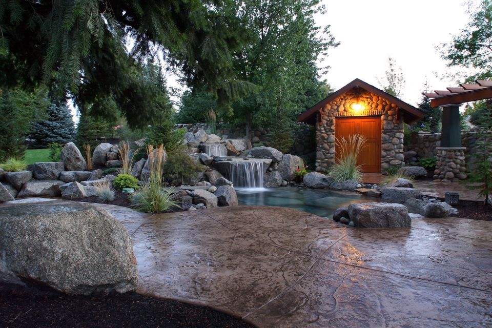 backyard resort water feature and pavers