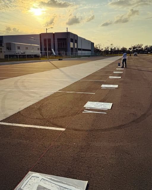 Parking Lot Striping Machine Laying down lines on concrete in San Francisco