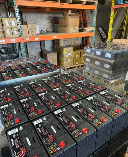 A warehouse filled with lots of batteries and boxes
