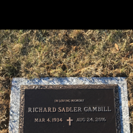 A bronze memorial marker for Richard Sadler Gambill (March 4, 1934 – August 24, 2016) set in a grass-covered cemetery plot.