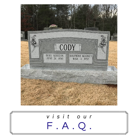 A gray granite headstone inscribed 