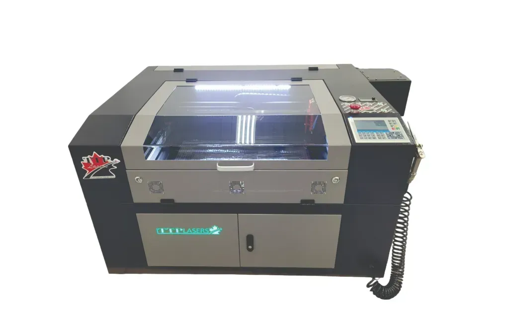 Laser cutting machine, black and gray with clear viewing lid, control panel on right.